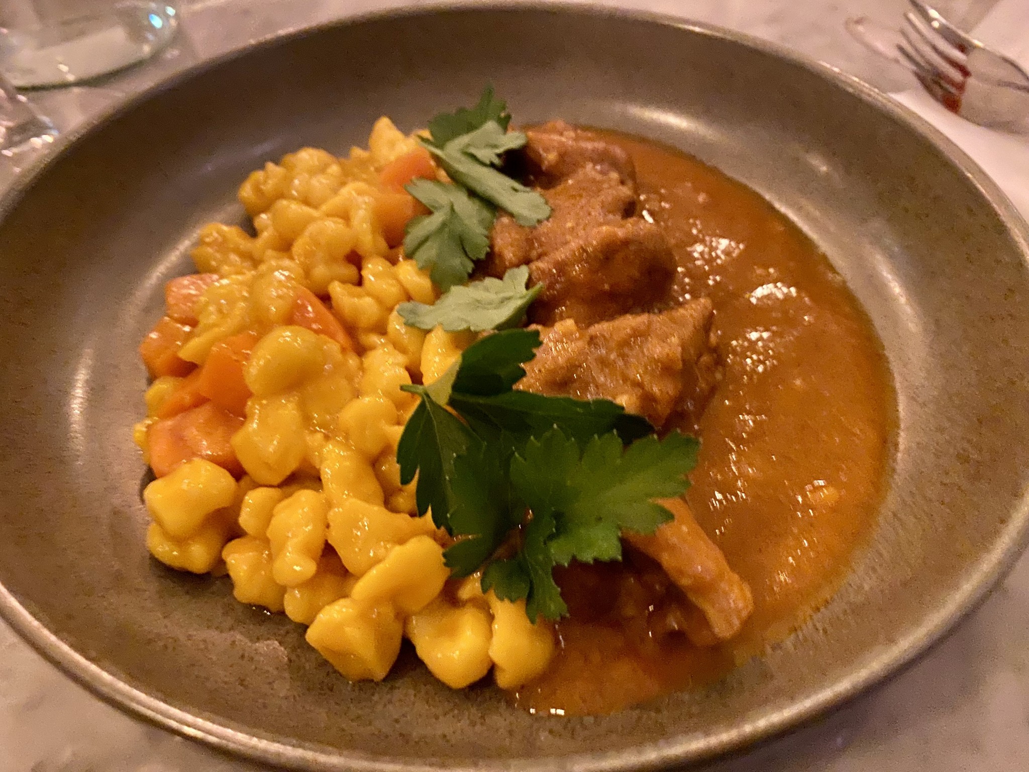 afrikanischer Hühner-Eintopf - mutig gewürzt und schöne Schärfe - Belly‘s Bistro - Wien