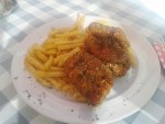 Schweinsschnitzel mit Kürbiskernpanade und Pommes Frites - Landhof Steinbäck - St.Stefan