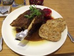 Gansl mit Serviettenknödel und Preiselbeerapfel - Café Restaurant Pan - Wien