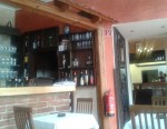 Innenbereich / Theke - Blick durch den NR Raum in die Schauküche - La Tavernetta - Graz