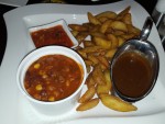 Beilagen: BBQ Beans, Hot Mexican Chili Sauce, Spicy Potatoes, Spicy Whisky Sauce - Clocktower American Bar & Grill - Wien-Süd - Brunn am Gebirge